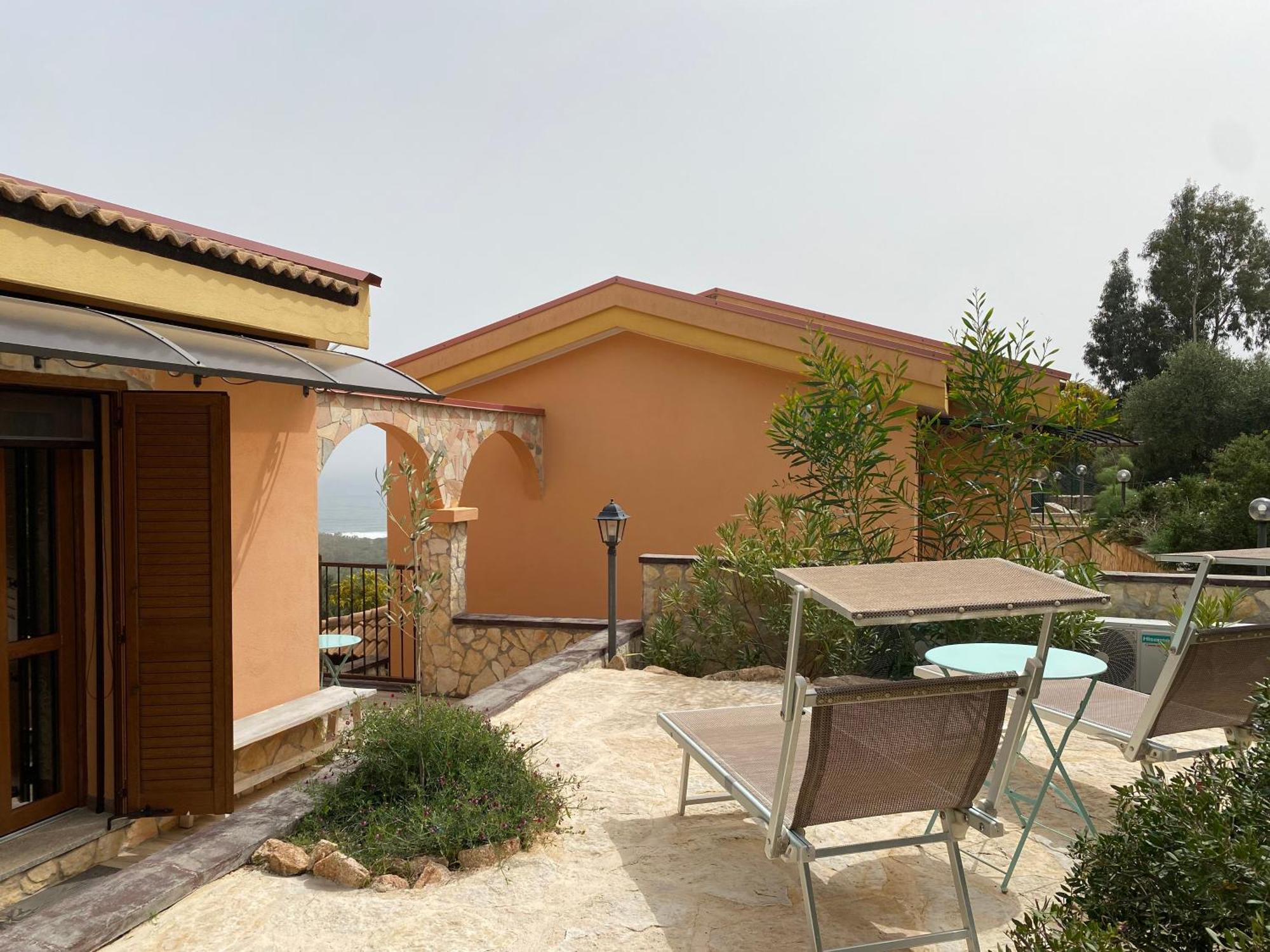 Residenza I Ginepri Vila Domus De Maria Exterior foto